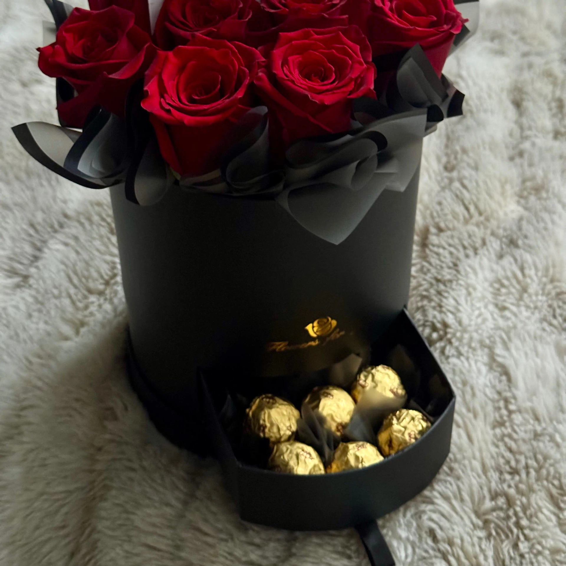 Box de rosas rojas con bombones