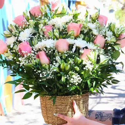 Pésame Rosado - Arreglo floral de condolencias