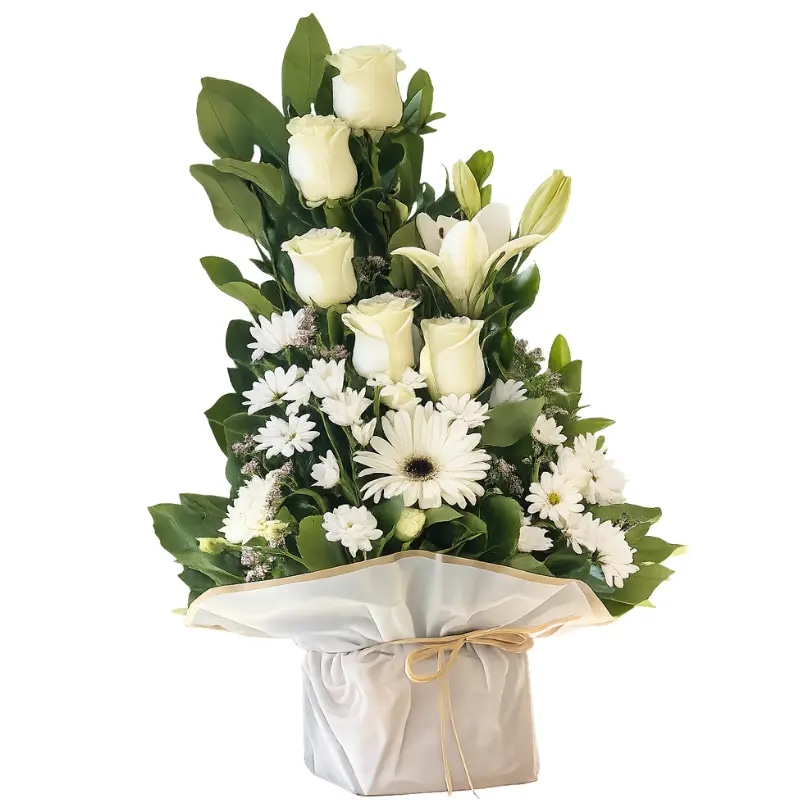 ARREGLO CONDOLENCIA 5 ROSAS, 1 LILIUM, 1 GERBERA Y ENVOLTURA